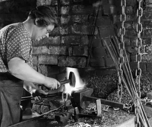 World War II Women. The blacksmiths mother takes over the forge whilst the soldiers are