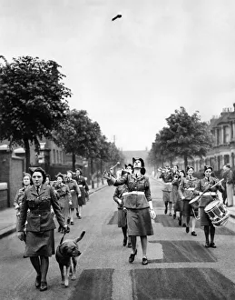 World War II Women: East Hams unit of the W. J. A. C. besides having a full trumpet