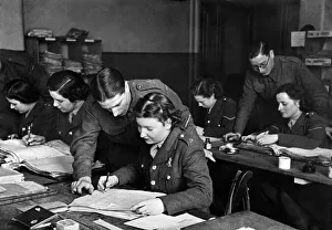 World War II: Women. Members of the ATS take over the pay corps work freeing up men to