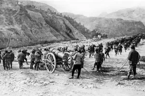 Italian Prints: World War One - Italian troops on march with cannon October 1915