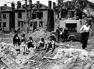 Bombs Prints: World War Two - Second World War - Families receive help