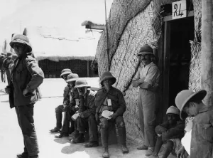 Battles And Campaigns Prints: A wounded British soldier seen outside a hospital hut close to the Shatt al