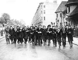 WRENS sailors and soldiers dance in the street in Brighton on VE Day, the end of WW2