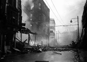 WW2 Air Raid Bomb Damage Portsmouth 1940 A firmens hose plays water on to