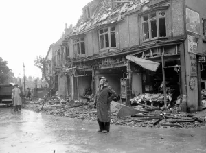 Loneliness Prints: WW2 Air Raid Damage Air raid damage at Bridlington A woman stands in
