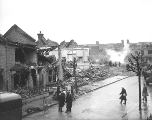 WW2 Air Raid Damage Bomb damage at East Ham - people survey the wreckage
