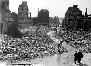 WW2 Air Raid Damage Bomb damage at Plymouth Two people stand surveying