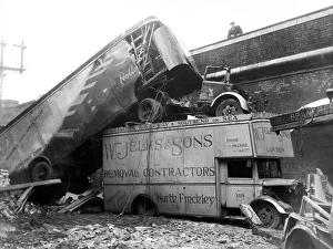Lorries Prints: WW2 Air Raid Damage Damaged trucks after the blitz circa 1941