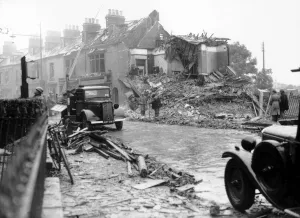 00204 Prints: WW2 Air Raid Damage on a London street after a German bombing raid the night