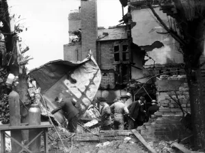 Searching Prints: WW2 Air Raid Damage Rescue workers searching a bombed building after a German