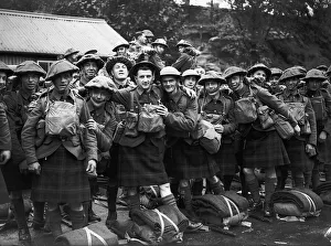 Kilts Prints: WW2 British Scottish Soldiers wearing army tunics and kilts with their kit prepare to
