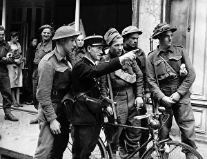 Observation Prints: WW2 British troops asking for directions in Normandy France during the invasion