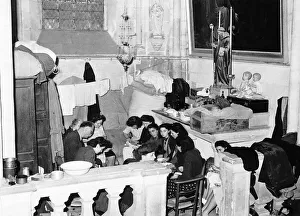 Refugees Prints: WW2 - Hundreds of refugees have been living in Caen Cathedral in the aisles