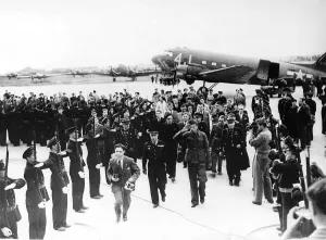 Prisoners Prints: WW2 Jules Garron is greeted with a special guard of honour as he arrive in Paris