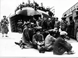 Refugees Prints: WW2 - June 1944 Military police guard a group of French refugees who were brought