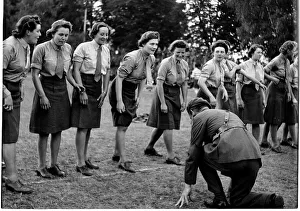 WW2 - June 1945 Competitors in Ladies Race at ATS sports meeting get instruction