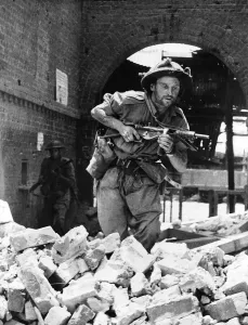 Ruins Prints: WW2 May 1945 British troops in Yamethin scour the ruins of the railway station