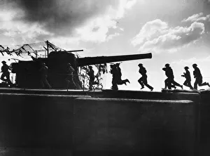 Silhouettes Prints: WW2 Royal Artillery gunners practice firing 370lb shells from their 9