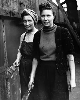 Welders Prints: WW2 Wives of naval men working as painters in a shipyard 1942 Women Holding