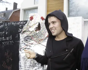 00333 Prints: X factor contestant Joe McElderry greets a fan outside the finalists house