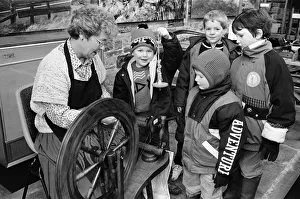 The yarn spinners... Mrs Marie Cooper demonstrates the art of spinning to a group of