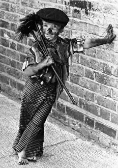 Images Dated 19th August 1980: Four year old chimney sweep Tommy Stafford in fancy dress to celebrate the 100th