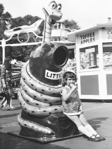 Ice Cream Prints: Three year old Christine Elliot from Harpenden hurries through her ice-lolly so that she