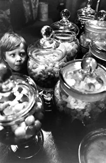 Sweets Prints: Three year old Christopher Kerr got a big bag of sweets for tuppence at the rebuilt Co-op