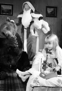 Bear Prints: Four year old Gayl Mather chats to Santa Claus about her adventures with Hercules