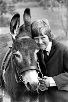 Nine year old girl with donkey at the Donkey racing championships May 1975