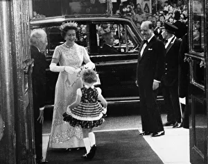 The Queen Prints: Six year old Mandy Kenyon of Stretford performs a curtsey after presenting a bouquet to