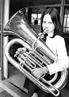 Images Dated 1st March 1976: Nine year old Pamela Henderson rehearsing her part with her E-flat Bass Tuba in