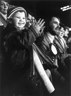 Relationships Prints: Three year old Terry Morris watching Manchester United with his dad in the grandstand