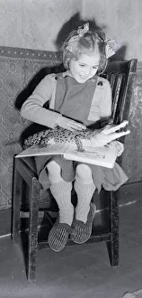 Reptiles Prints: Five year Pauline Darley playing with a baby crocodile December 1953