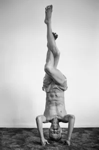 01248 Prints: Yoga positions. Position is called Eagle in Tripod Headstand