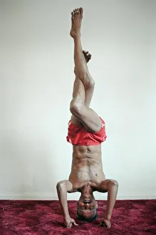 01248 Prints: Yoga positions. Position is called Eagle in Tripod Headstand