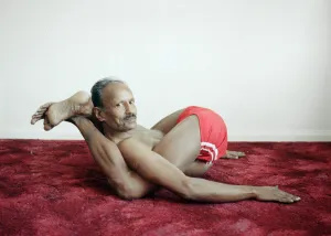01248 Prints: Yoga positions. Position is called Feet behind Neck (Dvi Pada Sirsasana