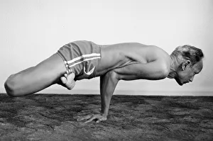01248 Prints: Yoga positions. Position is called Lotus in Peacock (Padma Mayurasana