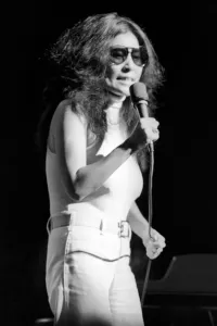 00044 Prints: Yoko Ono singing in a charity concert in New York with her husband John Lennon