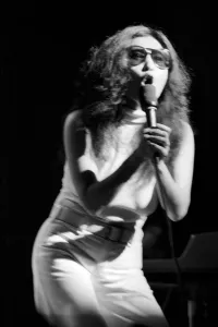 Yoko Ono singing in a charity concert in New York with her husband John Lennon