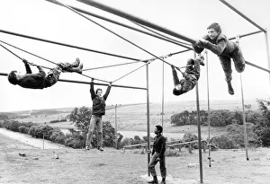 00085 Prints: These young boys from Hexham are getting the chance to use the climbing ropes