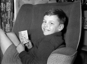 Teeth Prints: A young Fulham fan holds his ticket for the FA Cup 6th round match against Bristol Rovers