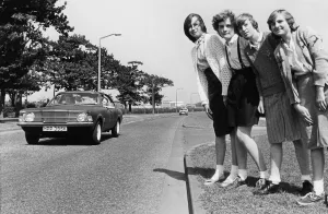 Road Safety Prints: A young girl who ran out of a School into the path of an oncoming car prompted a saftey