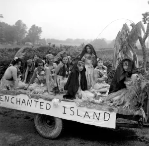 Young girls from Evington village Kent sat on a trailer through very heavy rain when they