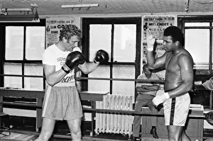 A young Joe Bugner (left) going through his paces with former World Heavyweight Champ