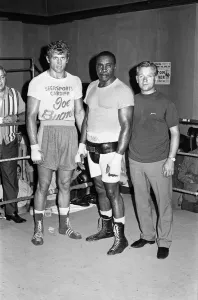 A young Joe Bugner (left) with former heavyweight champion Sonny Liston (centre
