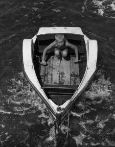 Core36 Prints: Young Keith Little from Chelmsford sails away in his paddle boat holiday Holidays