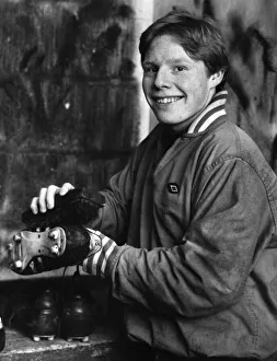 Young Prints: Young Liverpool footballer Sammy Lee getting his boots ready for the next match
