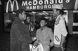 Images Dated 3rd April 1980: Young people standing outside McDonalds. 3rd April 1980