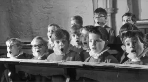 Young probationers at the Westminster Abbey School Choir sing a hymn during choir